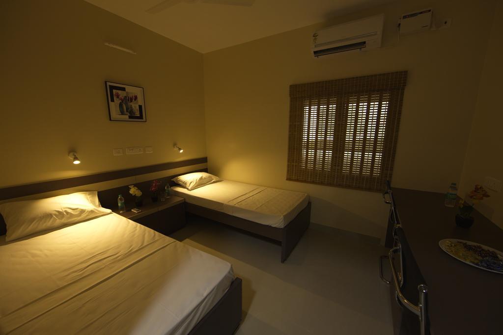 Pearl Guest House Madrás Habitación foto